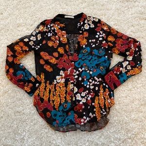 ALICE + OLIVIA blouse with vibrant floral graphics
